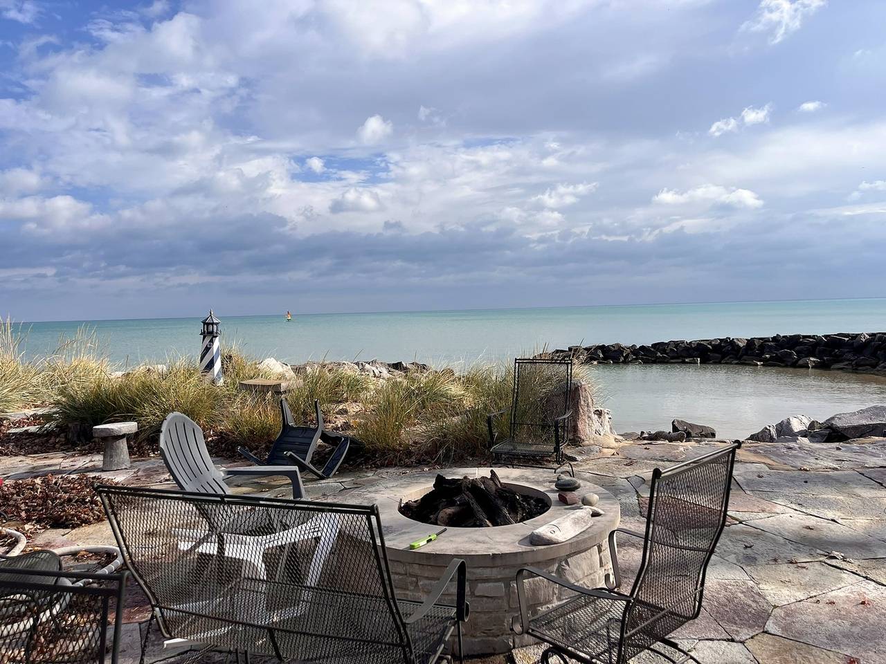 Stone patio and fire circle on the Lake Michigan shore in late fall
